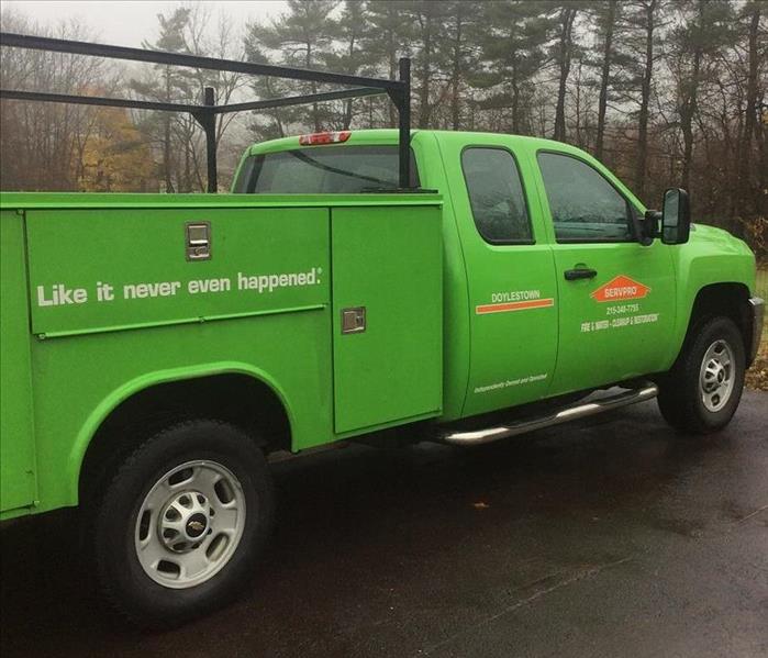 Green SERVPRO truck.