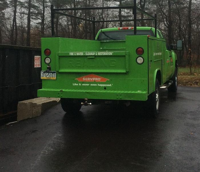 The back of a SERVPRO truck in a parking lot. 