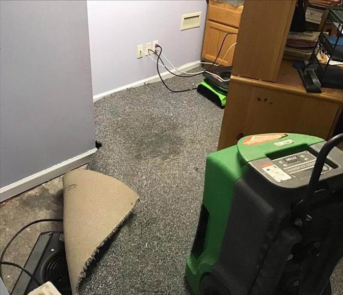 Drying equipment in closet space.