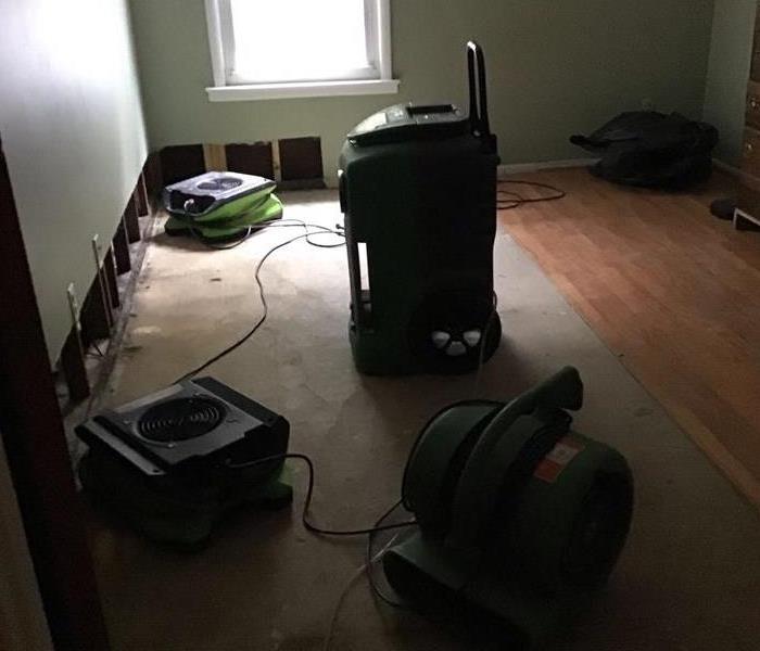 Drying equipment set up in a room.