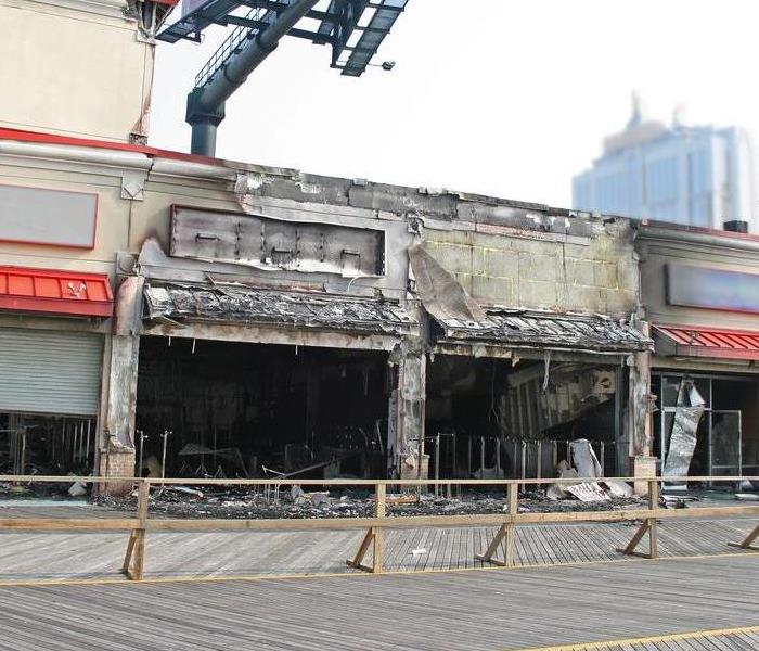 Business with exterior damage following a fire.