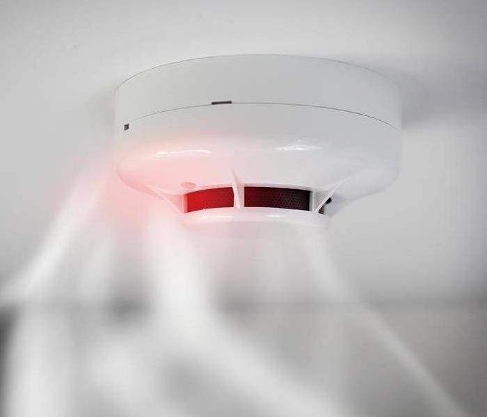 Smoke alarm detecting rising smoke.