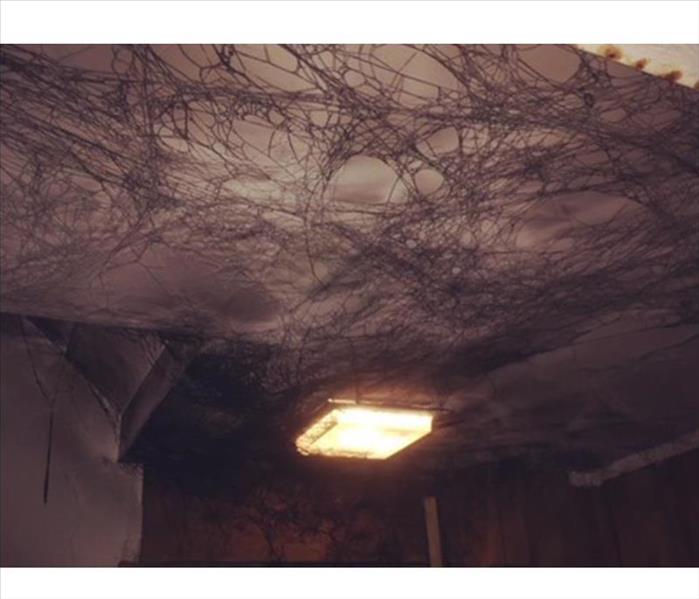 Puffback. Soot webs on ceiling